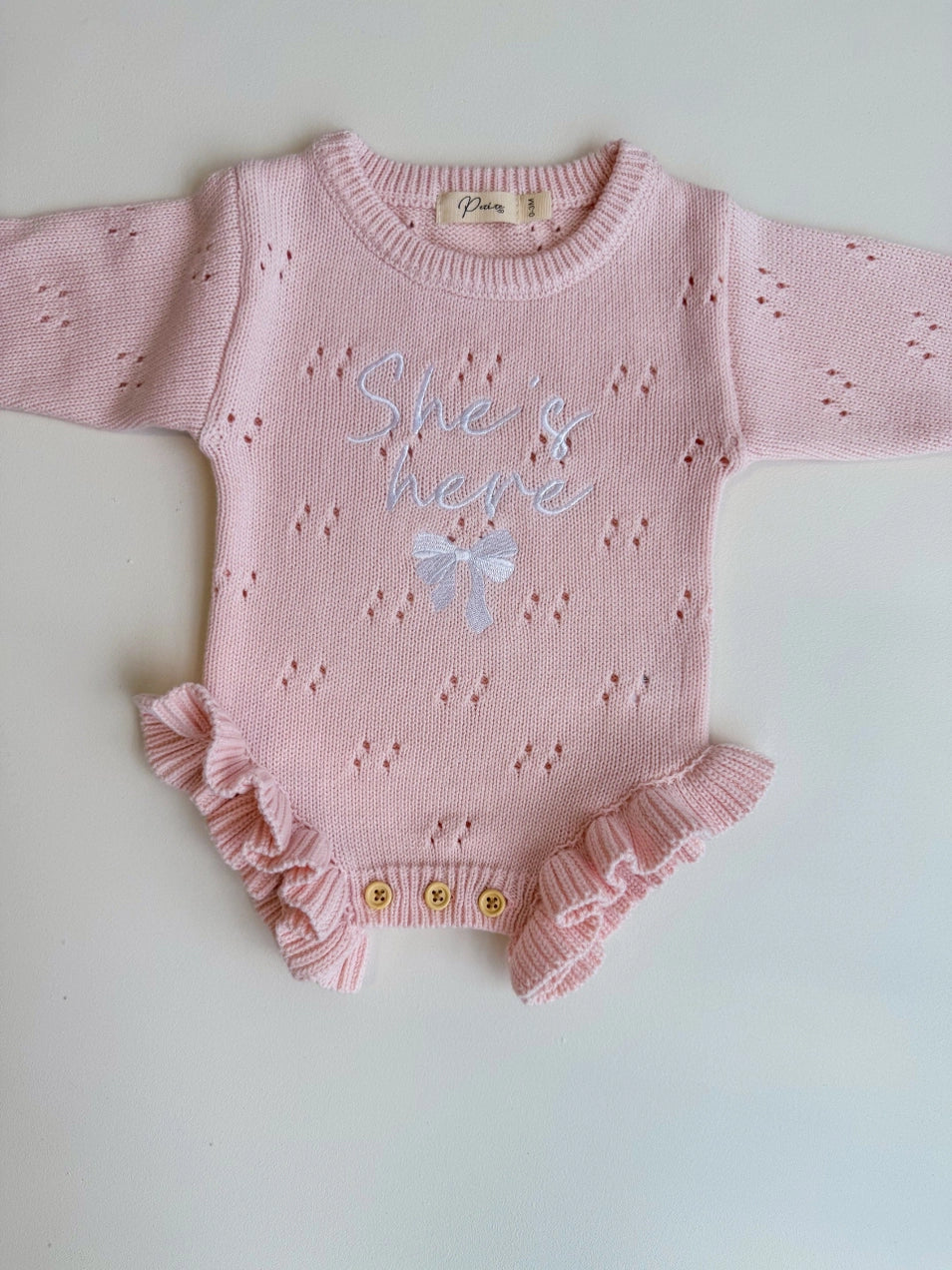 She's Here Bow - Pointelle Frill Romper | Baby Pink