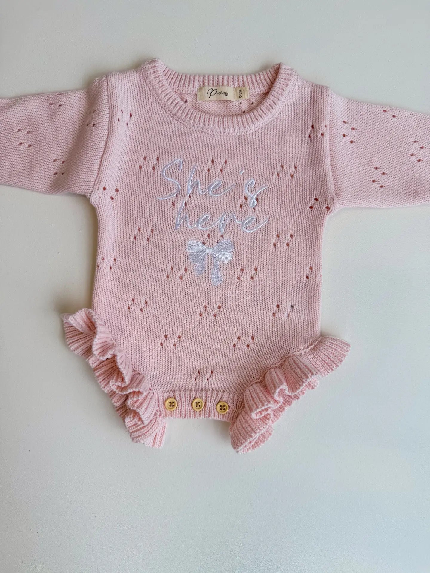 She's Here Bow - Pointelle Frill Romper | Baby Pink